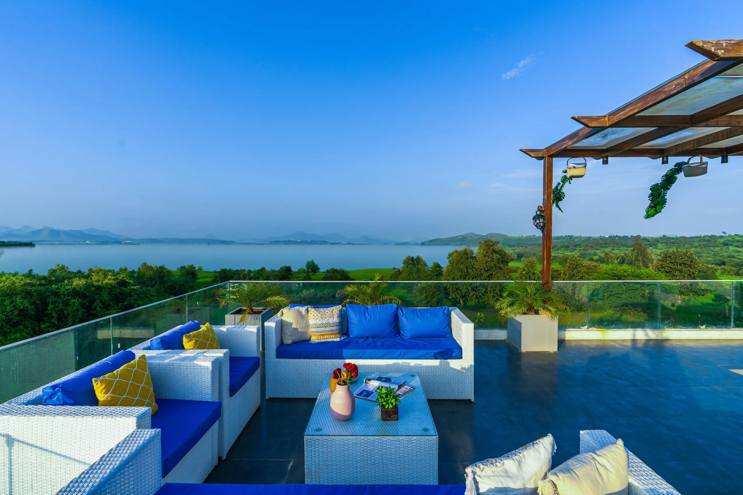 A terrace looking out over the water at dusk